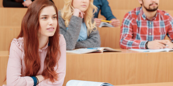 Female student smiles during lecture